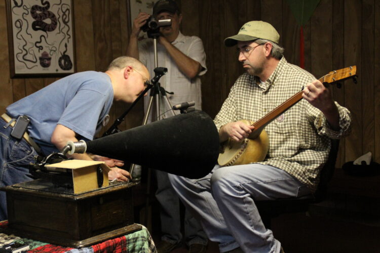Matin Fischer recording qa banjo player at Breakin' Up Winter 2012